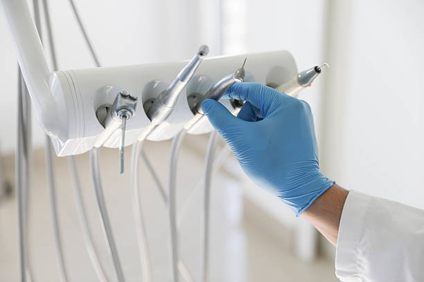 Professional Tooth Extraction technician working in Worthington, IN